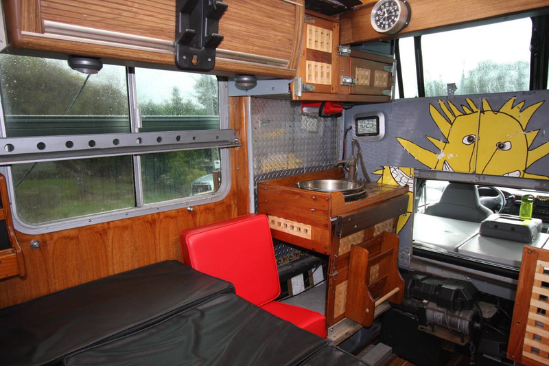 Illustration for article titled For $30,000, Could This 2006 Ford F-350 Car Carrier/Camper Be All The Prep You Need?